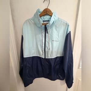 Columbia XL color block windbreaker in light blue and dark blue. My item.